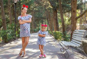 Mother and Daughter Wearing Identical Secondhand Clothes